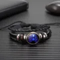 Pulsera de cuero trenzado multicapa vintage con signo zodiacal y cabochon de vidrio. - Virgo