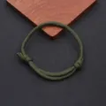 Green paracord braided bracelet detail, adjustable nautical nylon rope for daily wear. - Braided Adjustable Style (BN-0279) / Army Green