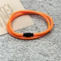 Orange braided rope bracelet with black magnetic clasp, trendy couple jewelry accessory. - Double-Layer Magnetic Clasp Orange