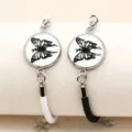 Paar geflochtene Partnerarmbänder mit schwarzem Schmetterling Glas Cabochon Edelstahl. - Schmetterlingsstil (BM-0128) / Ein Paar / Schwarz-Weißes Seil