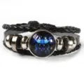 Pulsera de cuero negro trenzado con cuentas de metal retro y colgante de cúpula de vidrio Géminis. - Géminis