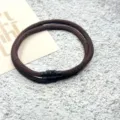Detail shot of brown braided rope bracelet featuring a sleek black magnetic clasp closure. - Double-Layer Magnetic Clasp Dark Coffee