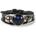Pulsera de cuero negro trenzado con dije del zodiaco cabujón de vidrio para parejas. - Libra