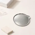 Minimalist stainless steel coaster, round silver metal tea cup mat, heat insulation pad variant. - Water Drop Coaster / Silver