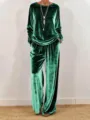 Detailed view of the women's green velvet casual lounge set featuring a cozy top and pants. - S / Top And Bottom / Green