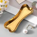 Gold bone-shaped metal tray for jewelry storage, aesthetic desktop organizer and small item display. - Bone / 9.3x3.8cm / Gold