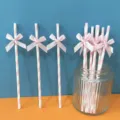 Cannucce di carta con fiocco rosa per decorazioni di festa, design a righe, ideali per compleanni. - Cannuccia con fiocco in nastro a righe rosa