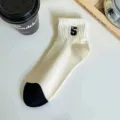 Women short socks black and white camellia embroidery fashionable college style daily wear - Number 5