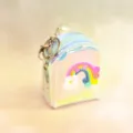 Detailed view of the holographic clear mini backpack coin purse featuring a cute rainbow cloud. - Rainbow Green