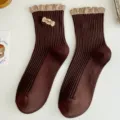 Calcetines marrones de canalé para mujer con bonito bordado y puño con volantes para invierno. - Talla única / Café Oscuro