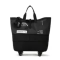 Vue détaillée du grand sac de voyage à roulettes 73L avec roues solides et sangles. - Style roue / Noir