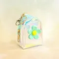 Holographic mini backpack keychain coin purse detail view, featuring cute flower pendant. - Flower Green