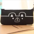 Cute cartoon animal PU leather pencil case, minimalist creative student stationery storage pouch. - Black Bear