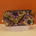 Stylish sequin cosmetic bag with pearl pendant, spacious trapezoid travel makeup pouch. - Uniform Mixed Color