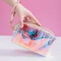 Transparent iridescent TPU cosmetic bag with wrist strap for portable travel toiletries storage. - Octagonal Pouch / AB Color