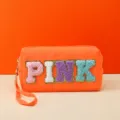 Orange cosmetic bag with stylish chenille letters, portable wrist strap and durable zipper closure. - PINK Series / 18X7X9CM / Fluorescent Orange