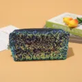 Stylish sequin cosmetic bag with large capacity, portable shiny makeup pouch for women. - Iridescent Blue