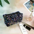 Sparkling sequin makeup bag for women, stylish travel toiletry pouch with zipper closure. - Royal Blue