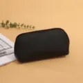 Black faux leather cosmetic bag, minimalist shell makeup pouch, portable travel organizer. - L / Black