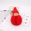 Niedlicher schlafender Baby Puppe Pompom Schlüsselanhänger, weicher Plüschtaschen Anhänger. - Rot