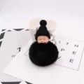 Süßer schlafender Babypuppe Plüsch Bommel Schlüsselanhänger, flauschiger Taschenanhänger. - Schwarz