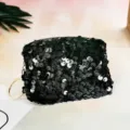 Black sequin mini coin purse detail view, fashionable small lipstick and essential storage pouch. - Black