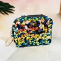Detail view of colorful sequin mini coin purse, trendy lipstick and daily small items storage. - Teal