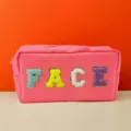 Pink waterproof cosmetic pouch featuring colorful chenille FACE letters for large makeup storage. - L / Peach