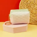 Mini quilted coin purse, pink and mint green color block mini storage bag with gold keychain. - Green
