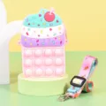 Kinder Silikon Pop Fidget Spielzeug Geldbörse süße Eis Umhängetasche mit buntem Gurt - 8x13,3x4 cm / Rosa