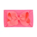Ultra-soft fluorescent pink nylon baby headband with a large coral ribbed bow for infants - Coral Pink