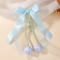Light blue tulip bow hair clip with elegant long streamers for children's fashion - Tulip Bow Ribbon Style (5533) / Blue