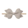 Diadema de nylon suave para bebé con un lazo de tela de lino texturizado en color beige - Lazo de 8.5cm / Gris Beige