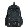 Close-up of stylish black school backpack featuring white lightning and starry print - Black