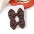 Pair of dark brown embroidered fabric bow hair clips for girls on white display card - Embroidered Floral Bow Hair Clip (15)