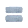 Macro detail showing light blue embroidered fabric hair clips with floral pattern - Embroidered Floral Style (7)