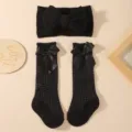 Newborn infant black headband and mesh socks set with cute satin bows for babies - Three-Piece Set / Black