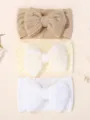 Set of three soft baby headbands with large bows in khaki, yellow, and white colors - Khaki/Yellow/White