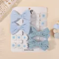 Juego de pinzas para el cabello con lazos azules y blancos para niños en tarjeta decorativa. - Juego de 8 piezas / Azul