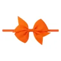 Bandeau élastique orange pour bébé avec un grand nœud en ruban gros-grain sur fond blanc - Orange (9)