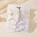 Elegante juego de pinzas para el cabello blancas para niños con lazos y flores en tarjeta - Blanco