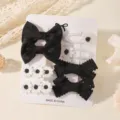 Elegante juego de pinzas para el pelo infantiles con lazos negros y margaritas blancas - Negro