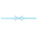 Morbida fascia per neonati in nylon azzurro con un fiocco in nastro grosgrain a coste - Azzurro