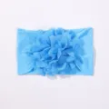 Fascia per capelli in nylon celeste con un grande fiore in tessuto per neonati e bimbi - Celeste