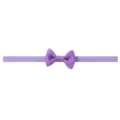 Soft purple baby bow headband made of stretchy seamless nylon for infants and toddlers - Purple