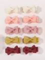 Detailed view of the 10-piece mini bow hair clip set in assorted colors - 10 Pieces Pack