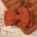 Diadema suave para bebé color terracota con lazo y elegante punto jacquard para niños - Estilo Caramelo (14)