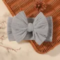 Diadema elástica gris de jacquard para bebé con lazo doble grande sobre una cesta - Estilo Gris (15)