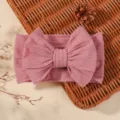 Soft pink ribbed baby headband featuring a large decorative jacquard bow accessory. - Pink Style (9)
