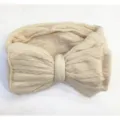 Soft beige cable knit wide baby headband featuring a large elastic decorative bow - Beige Style (1)
